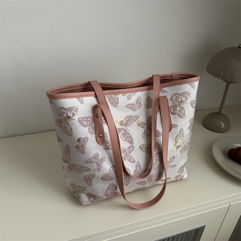 Butterfly leather tote bag with zip