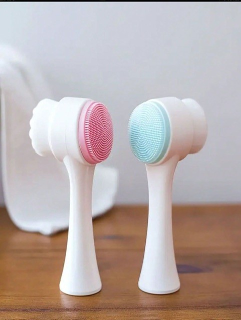 Double sided face brush