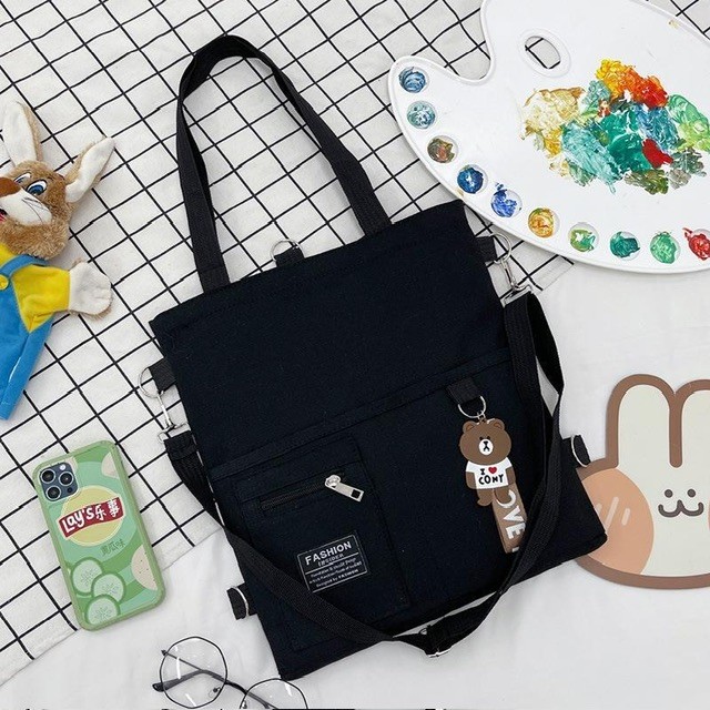 Canvas tote bag with compartment and zip